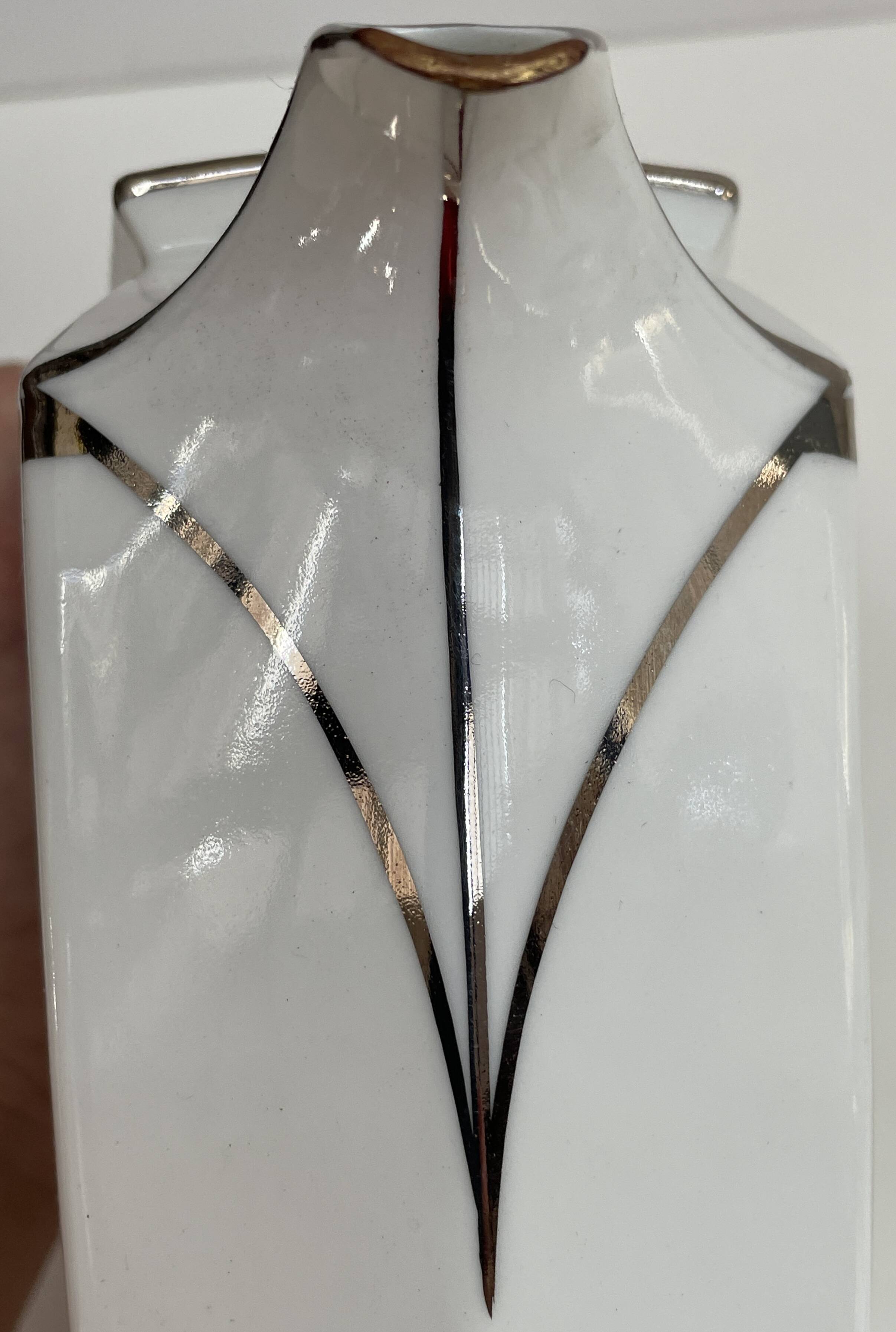 Art Deco service, porcelain with platinum, Kintsugi restoration.