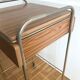 Serving bedside in gold metal and formica