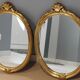 Paire de miroirs oval  doré vintage
