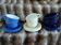 6 antique Émile Henry cups