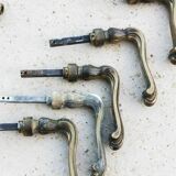 Set of vintage bronze cleanliness plates and handles