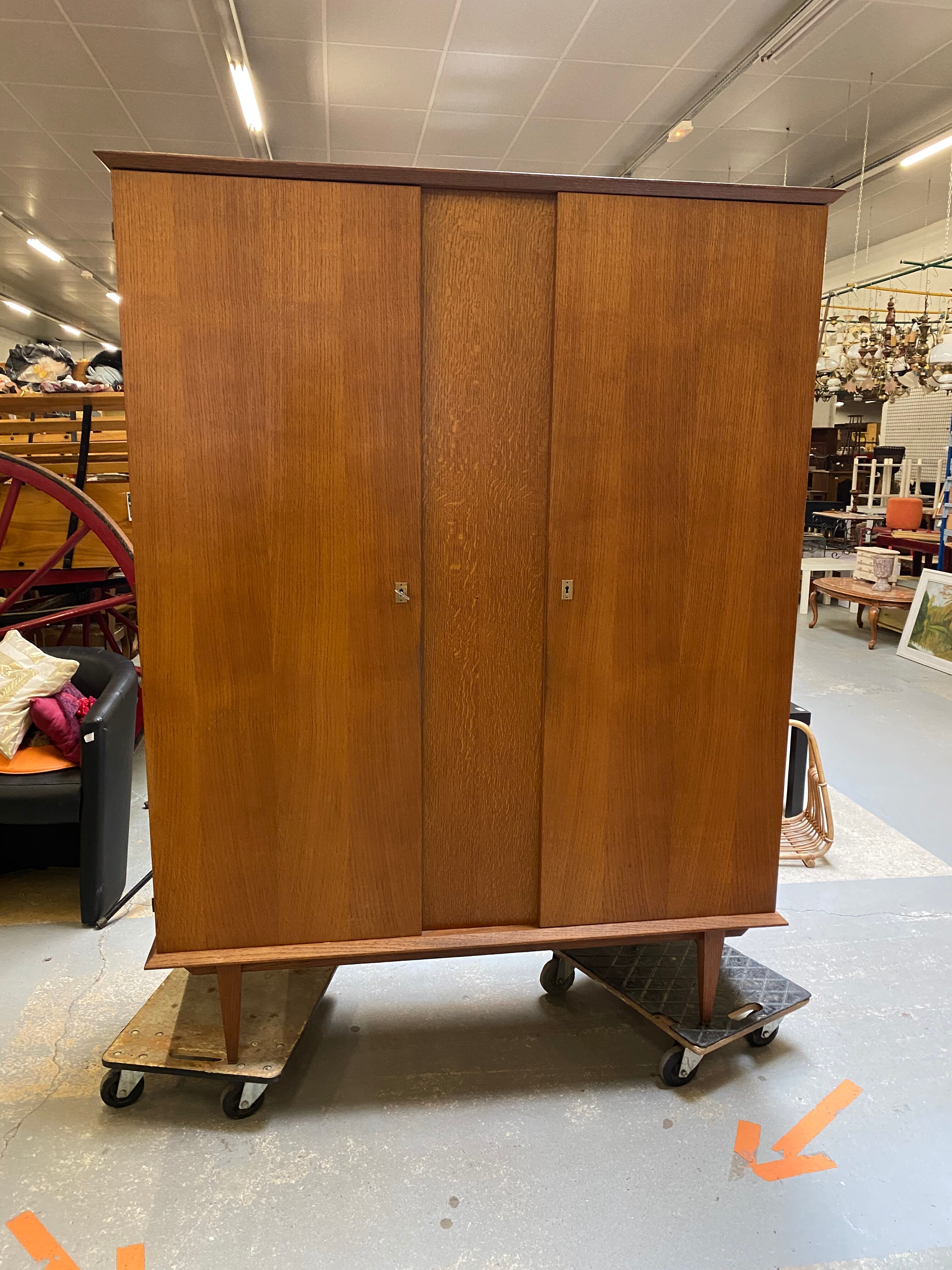 Vintage compass foot cabinet