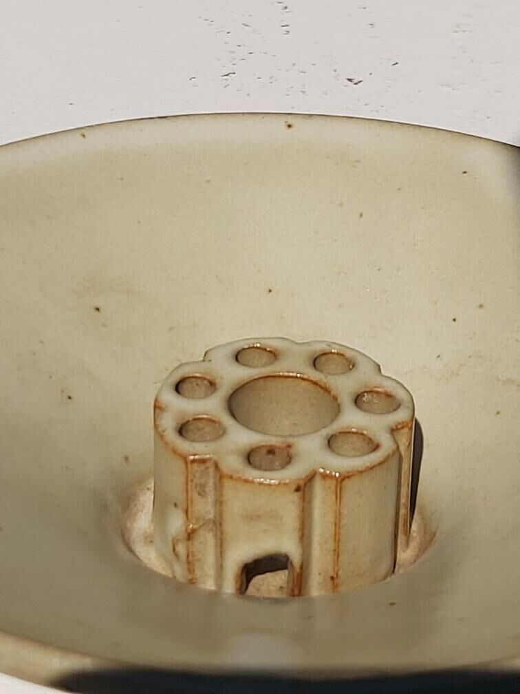 Taizé flower picket cut in sandstone