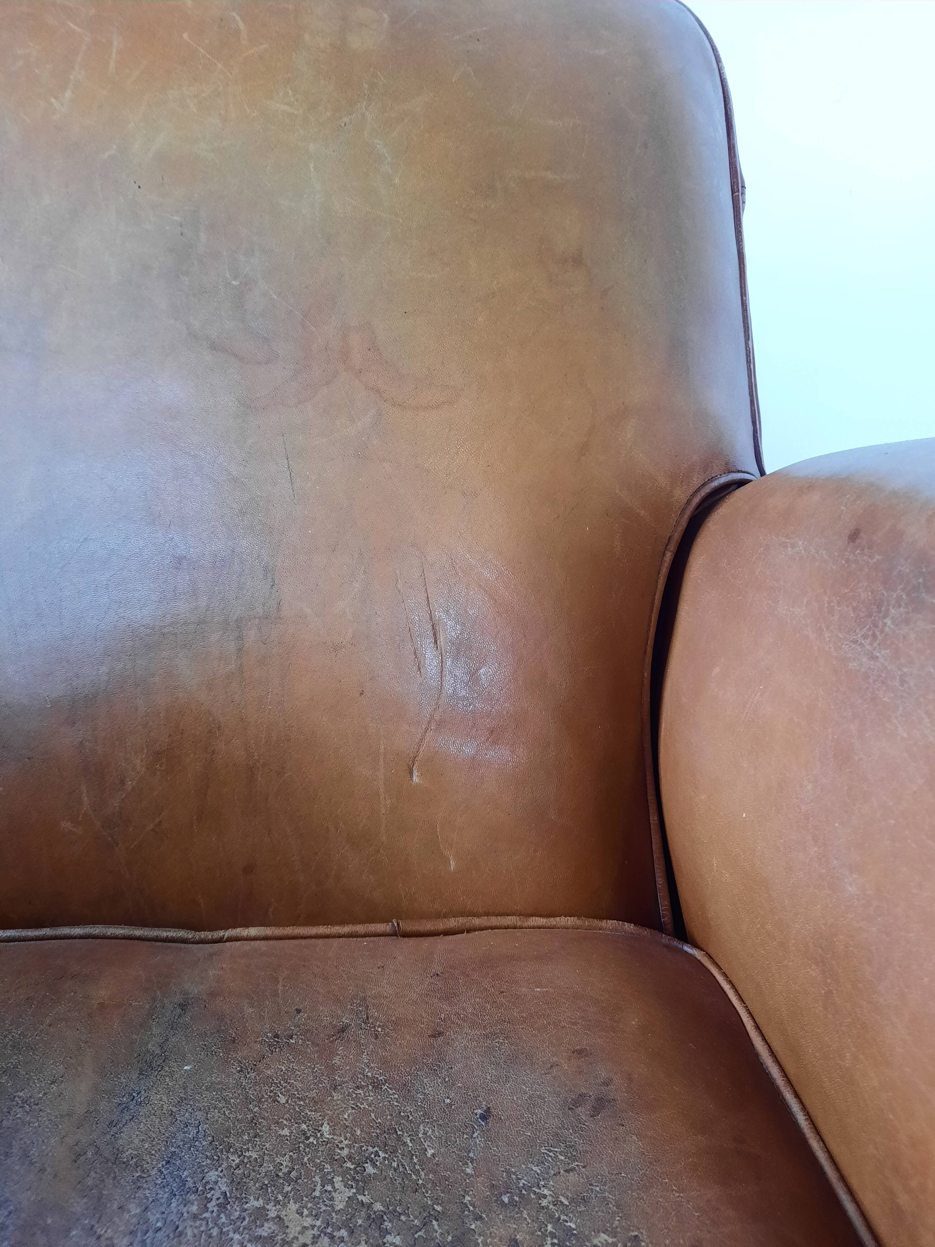 Old leather club chair 1940-1950
