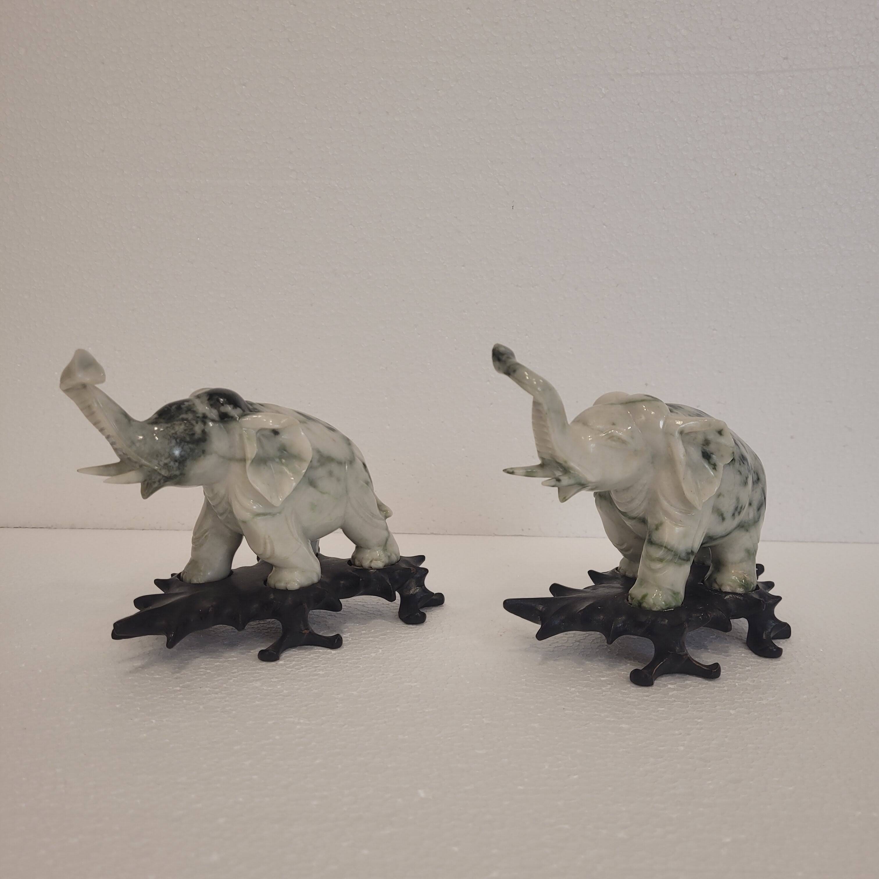 Pair of elephant paperweights, veined marble, 80s - France