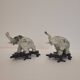 Pair of elephant paperweights, veined marble, 80s - France