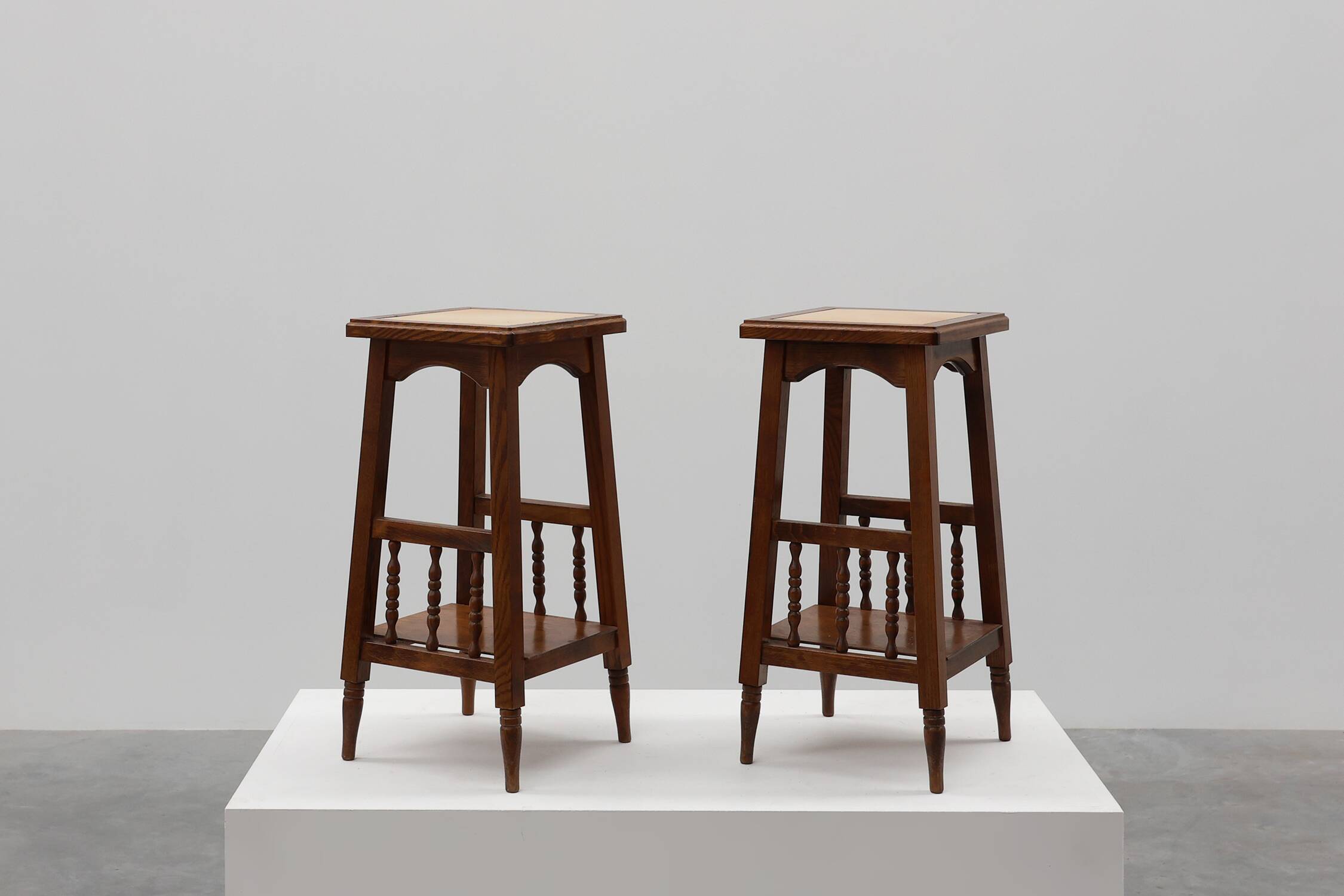 Pair of 20th century rustic wooden side tables with ceramic tile top