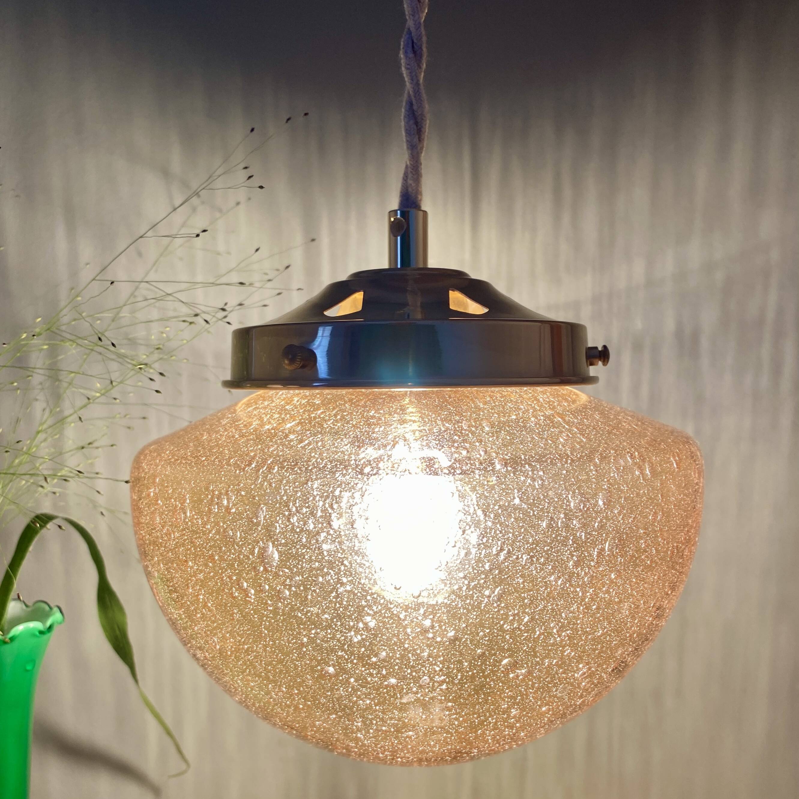 Vintage globe pendant light in bubbled amber glass