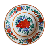 Floral decorative plate and bunch of grapes from eastern countries