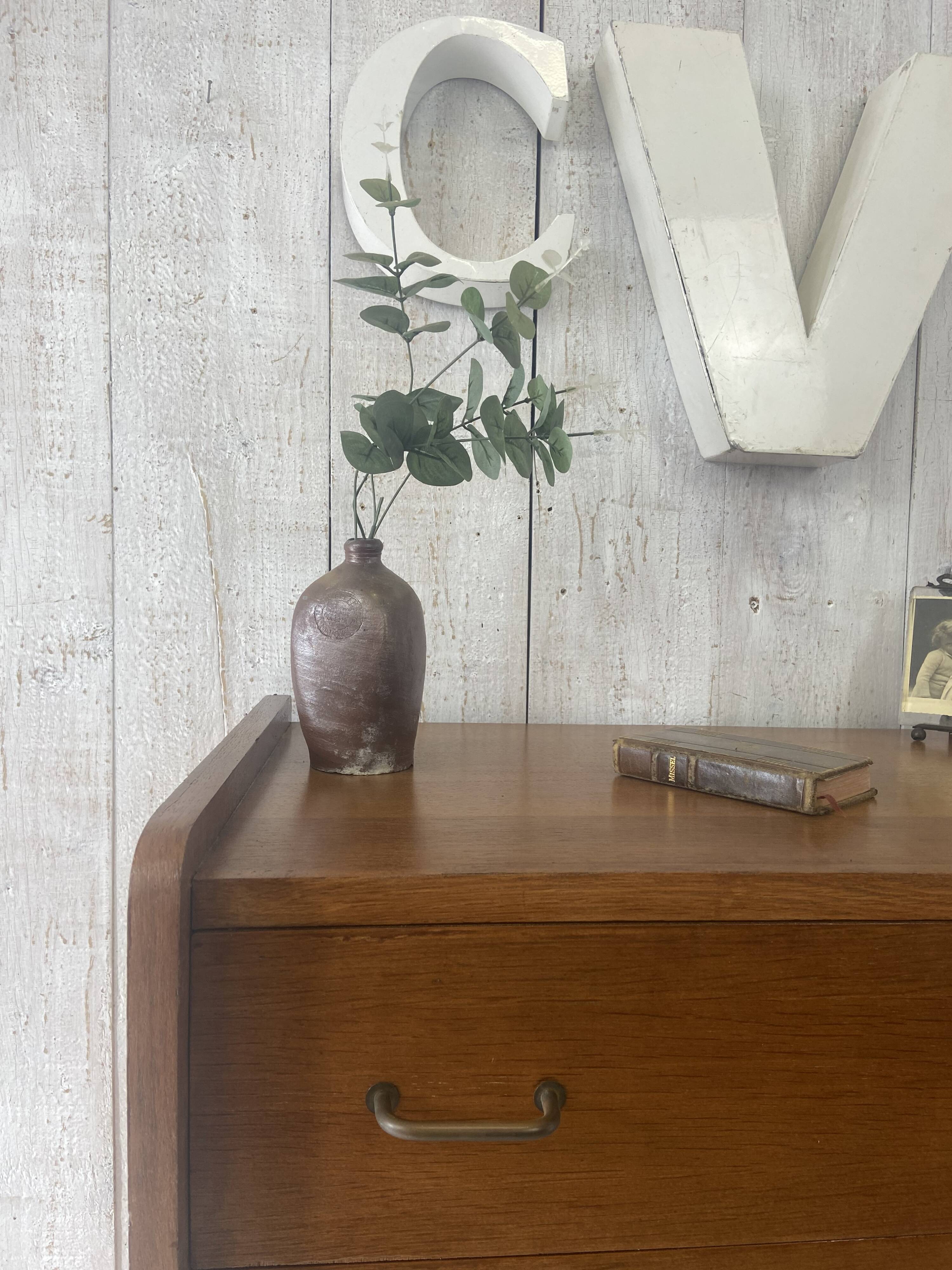 Vintage chest of drawers with tapered legs