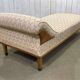 English daybed from the early 20th century in oak, some stains on the fabric