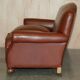 Edwardian leather club canapé circa 1910 with feather cushions.
