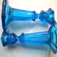 2 blue glass doll candlesticks