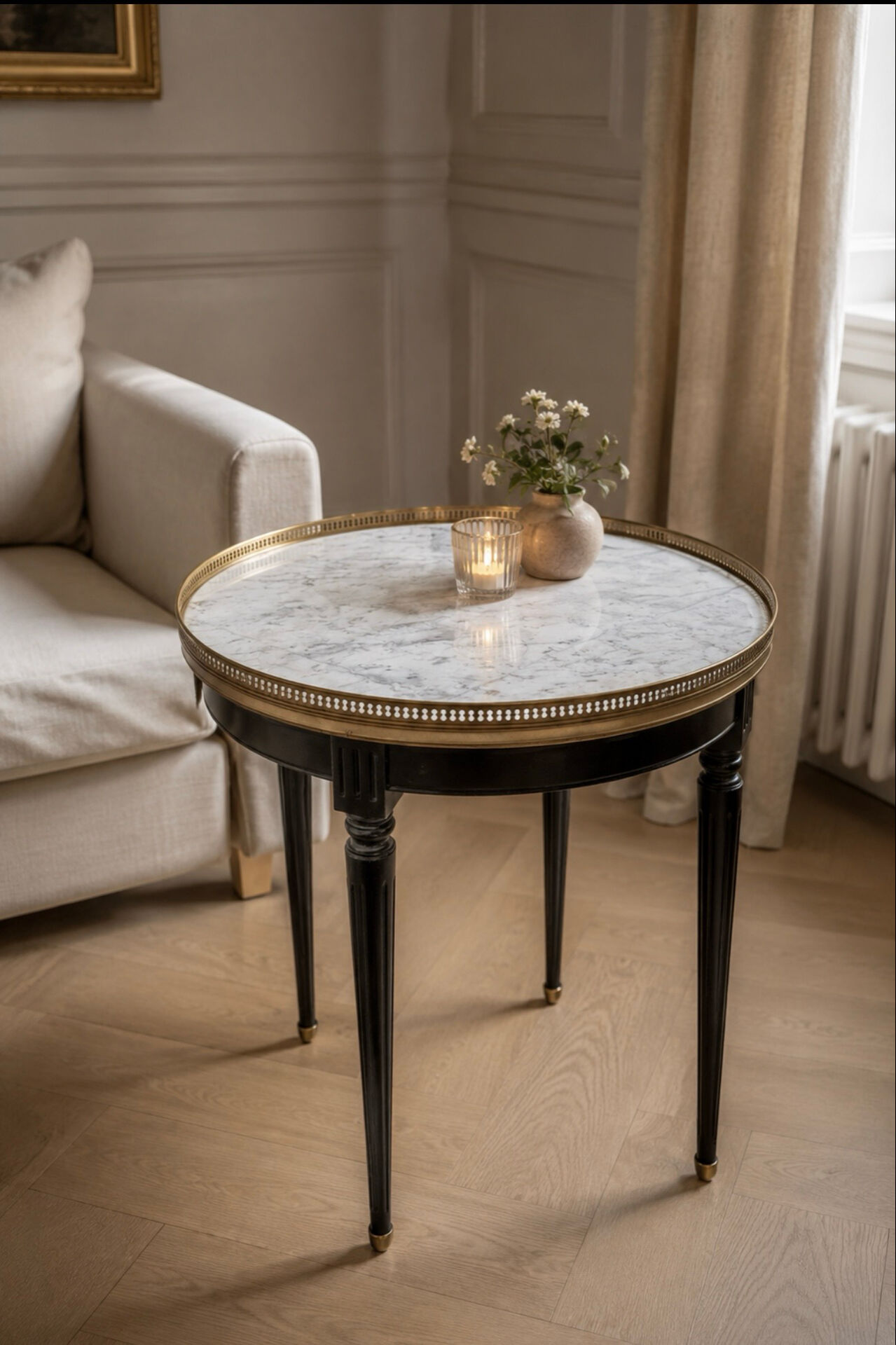 Bouillotte table in Louis XVI style made of blackened wood, marble, and brass.