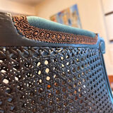 Louis XVI armchair with caning and dark green velvet