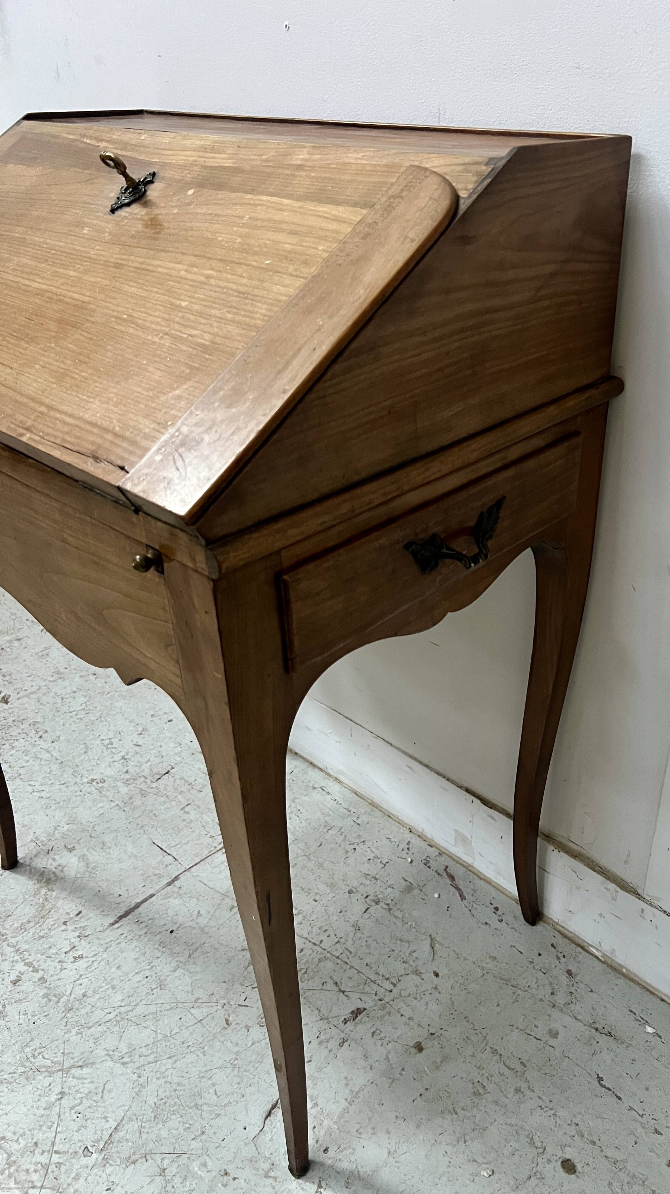 20th century slant-front desk in solid cherry wood