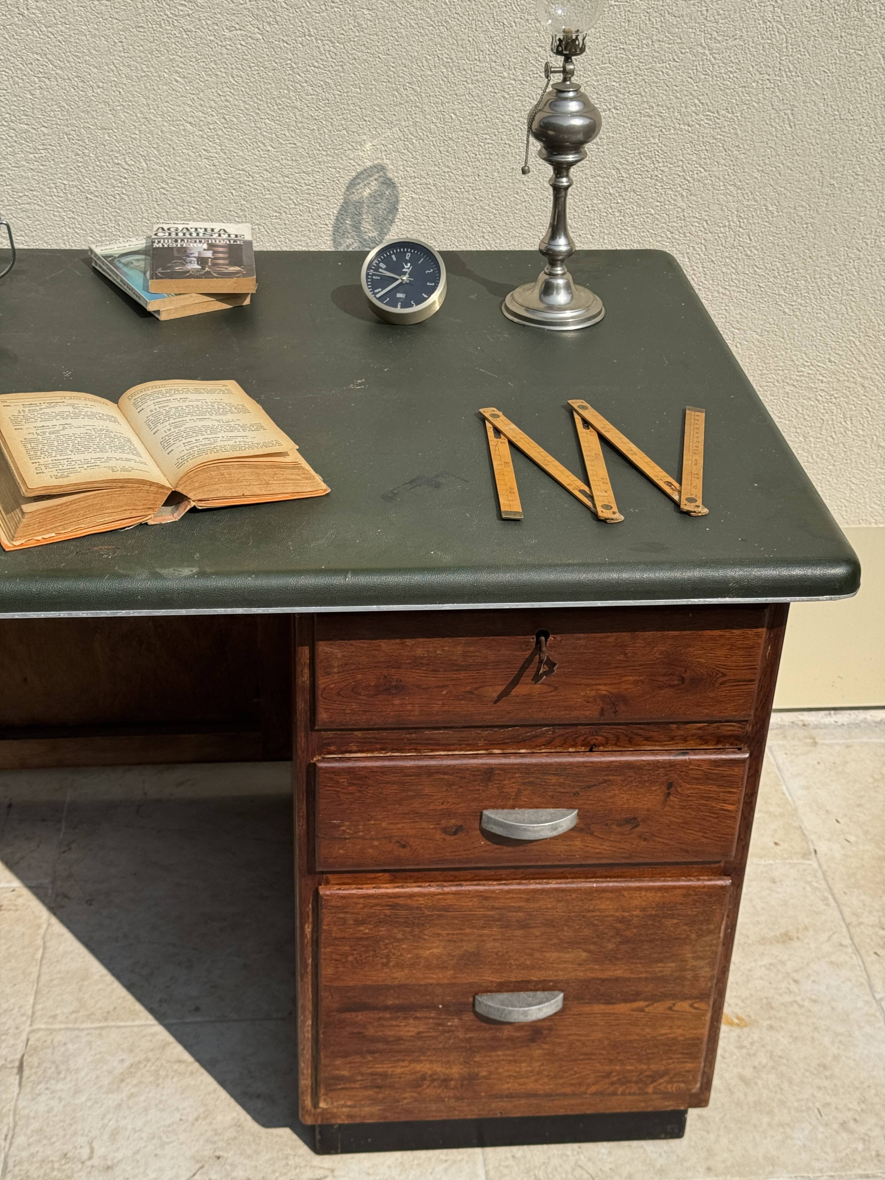Modernist desk in wood and green moleskin upholstery