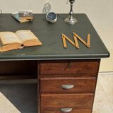 Modernist desk in wood and green moleskin upholstery