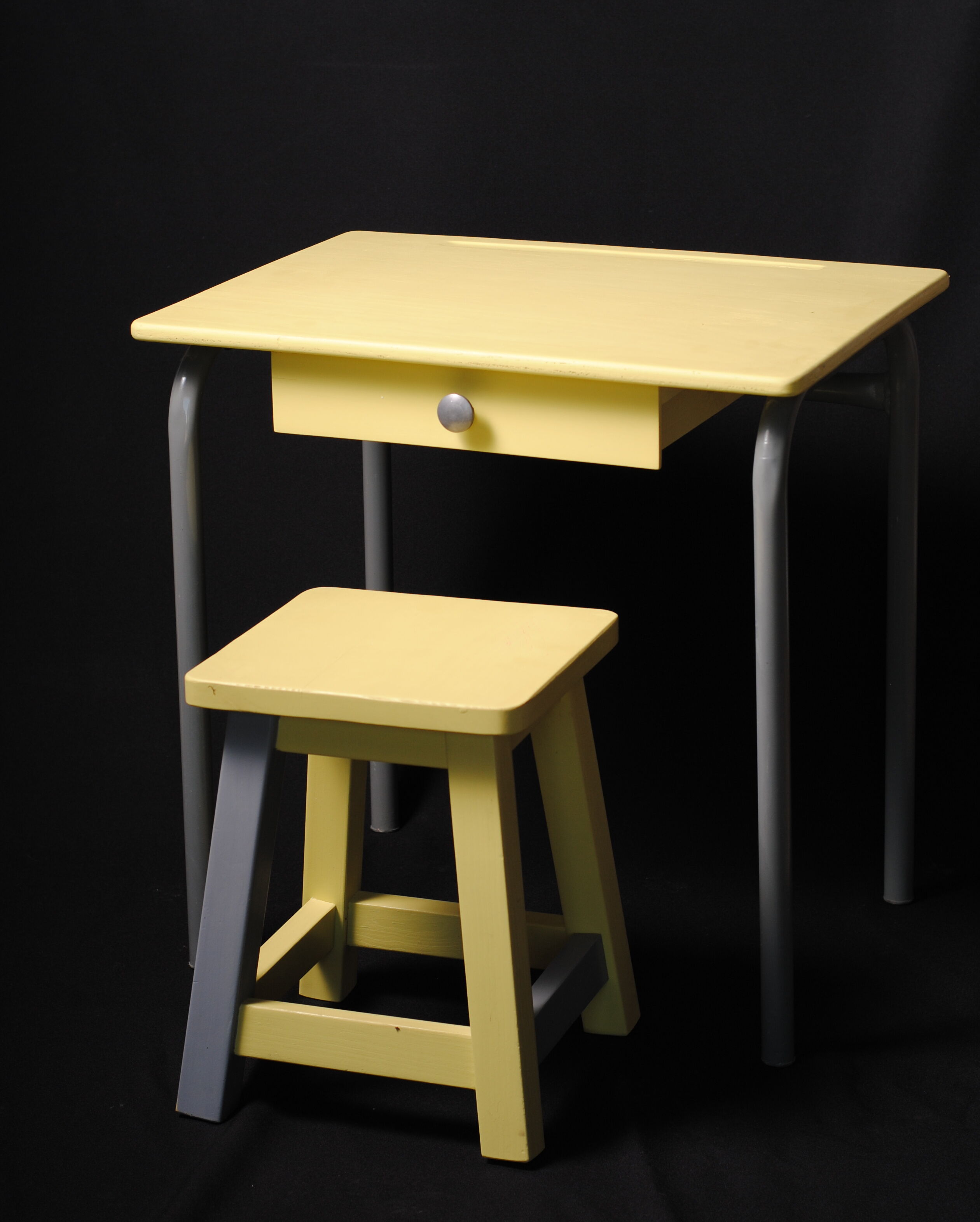 Yellow child office with his stool