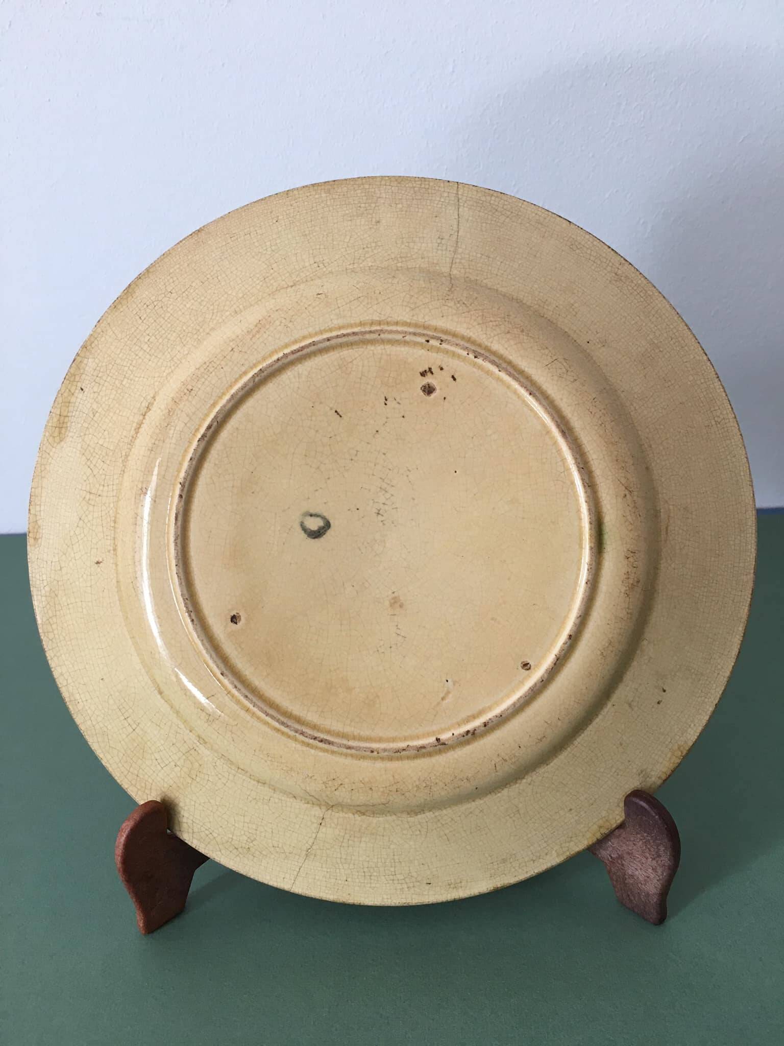 Old barbotine dessert plate. Floral patterns