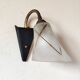 1950s wall lamp, metal, flexible brass stem and opaque shade.
