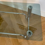 Coffee table in chrome-plated metal and smoked glass