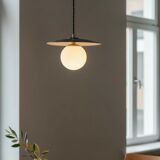Industrial pendant light made of speckled enameled sheet metal and opaline