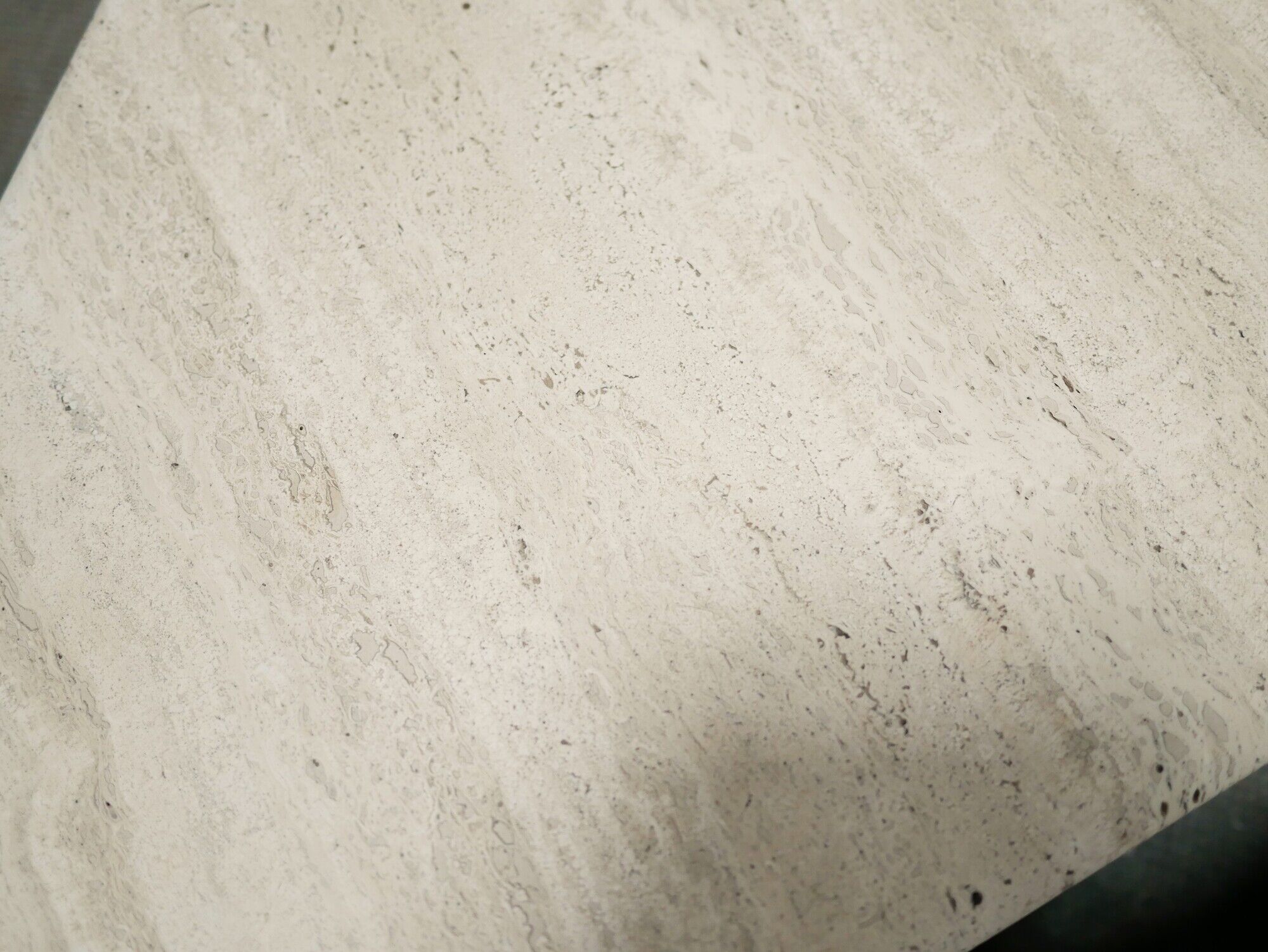 Series of 2 vintage travertine coffee tables published by Roche Bobois