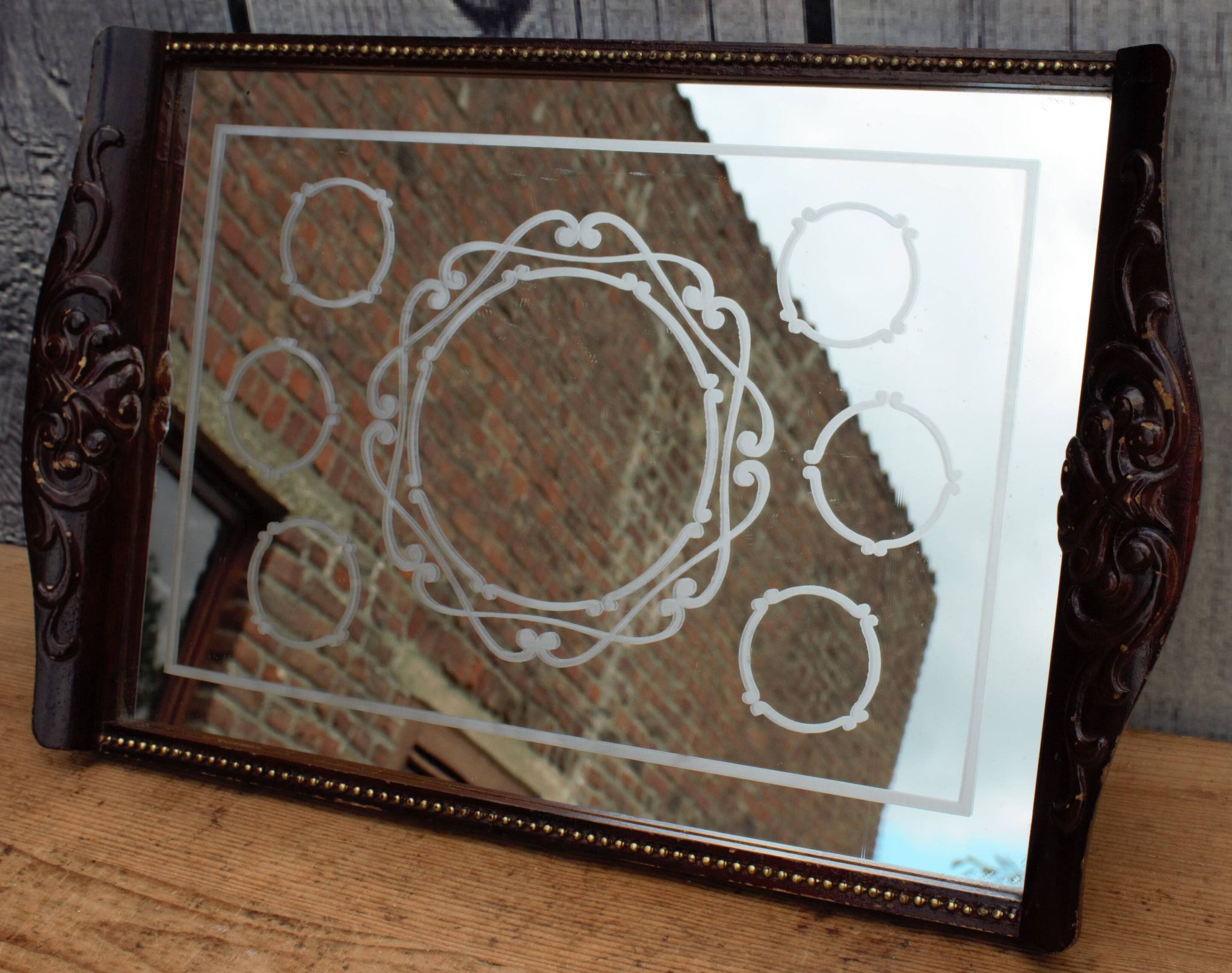 Old wooden tray with sandblasted mirror