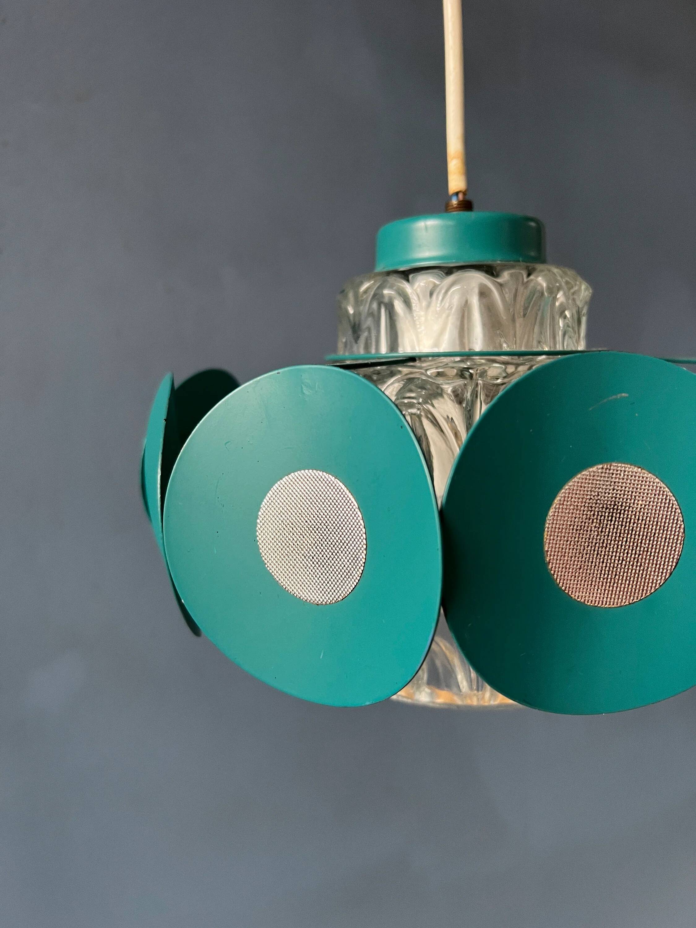 Suspension Space Age with glass shade and green/blue metal structure.