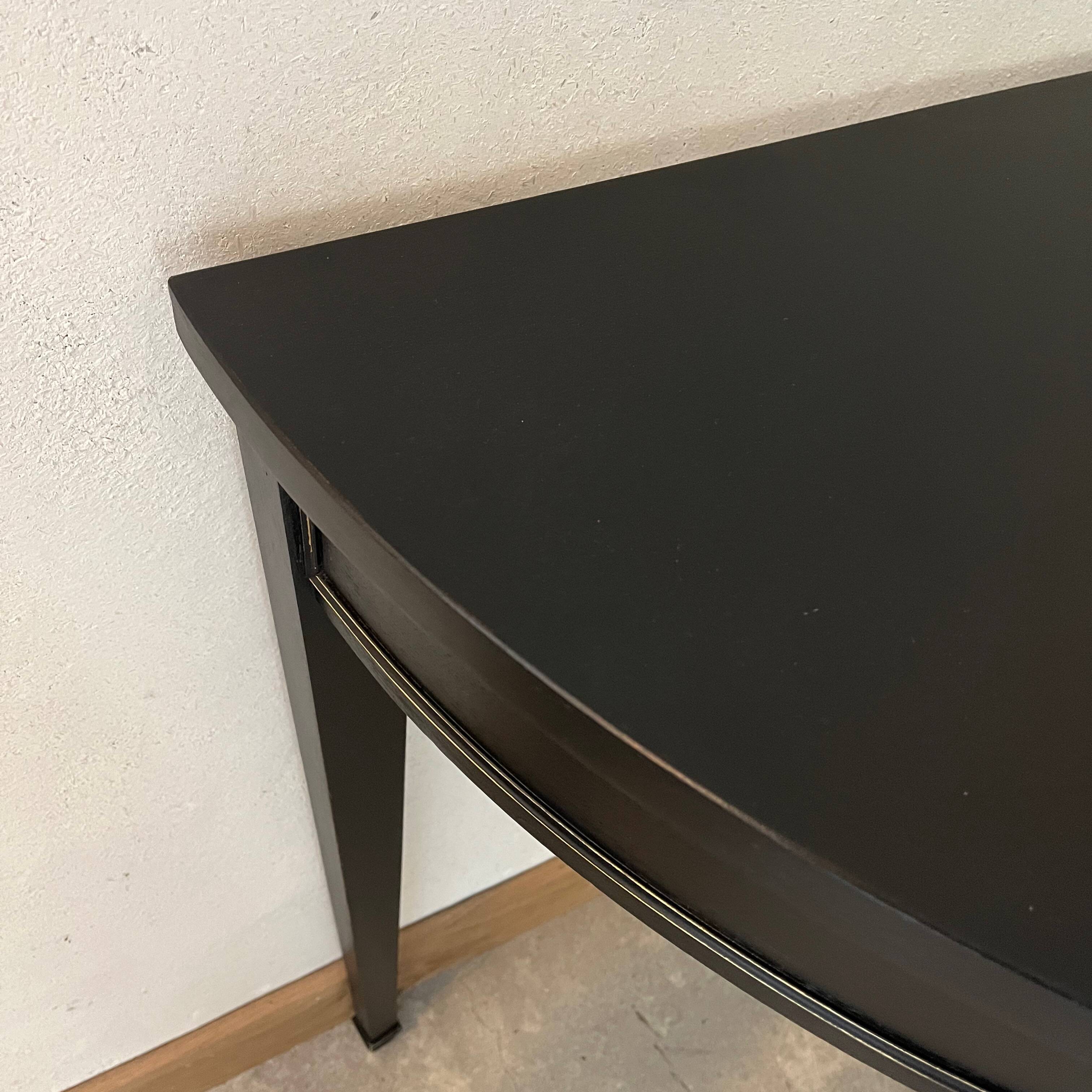 Black half-moon console