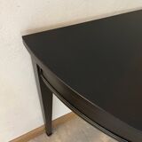 Black half-moon console