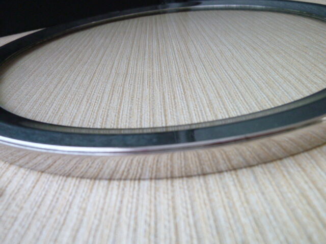 Glass and silver metal underside