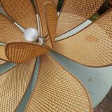 Lotus flower suspension in vintage cannage