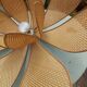 Lotus flower suspension in vintage cannage