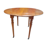 Round table with walnut shutter with extension