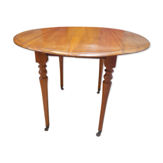 Round table with walnut shutter with extension