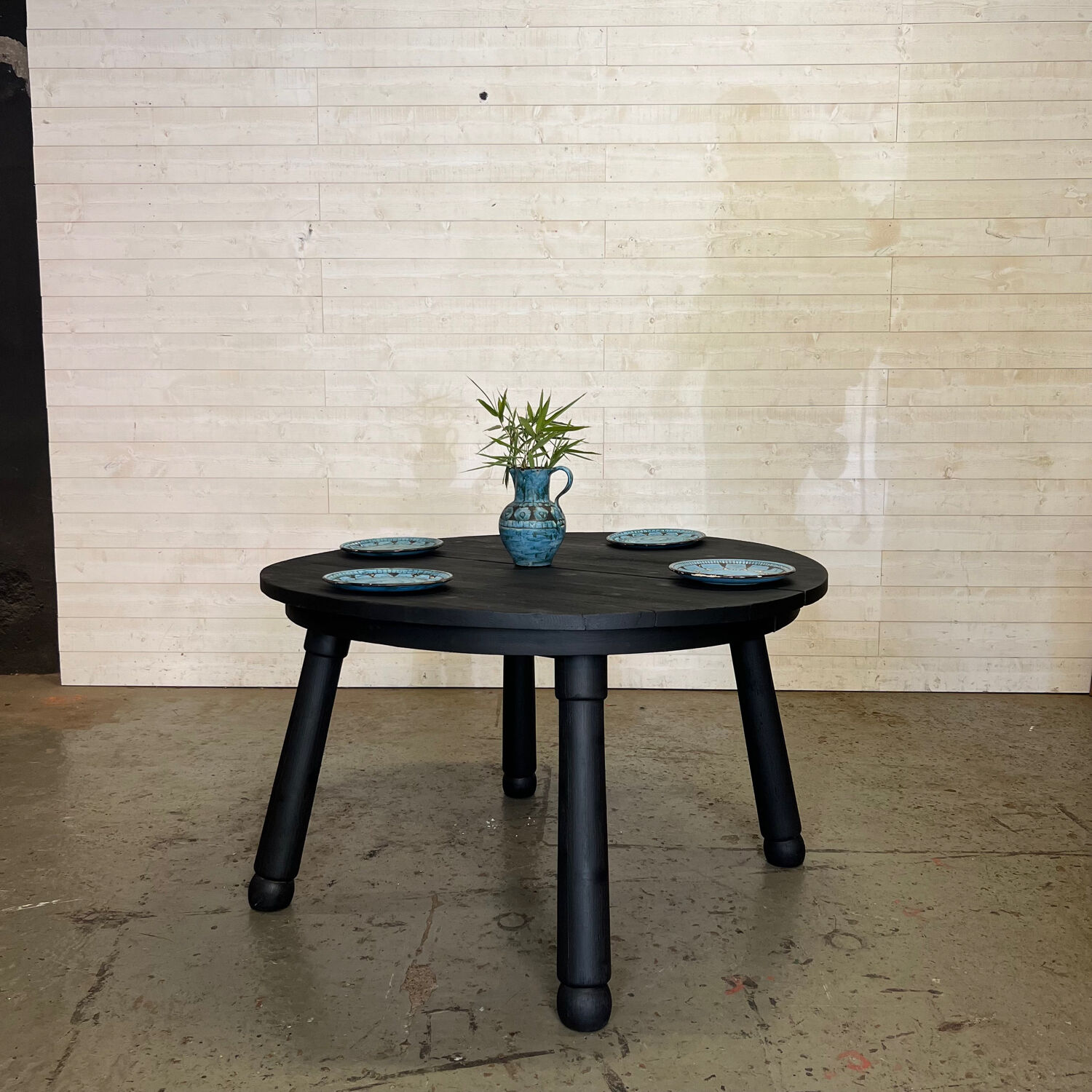 Brutalist round table in burnt wood yakisugi
