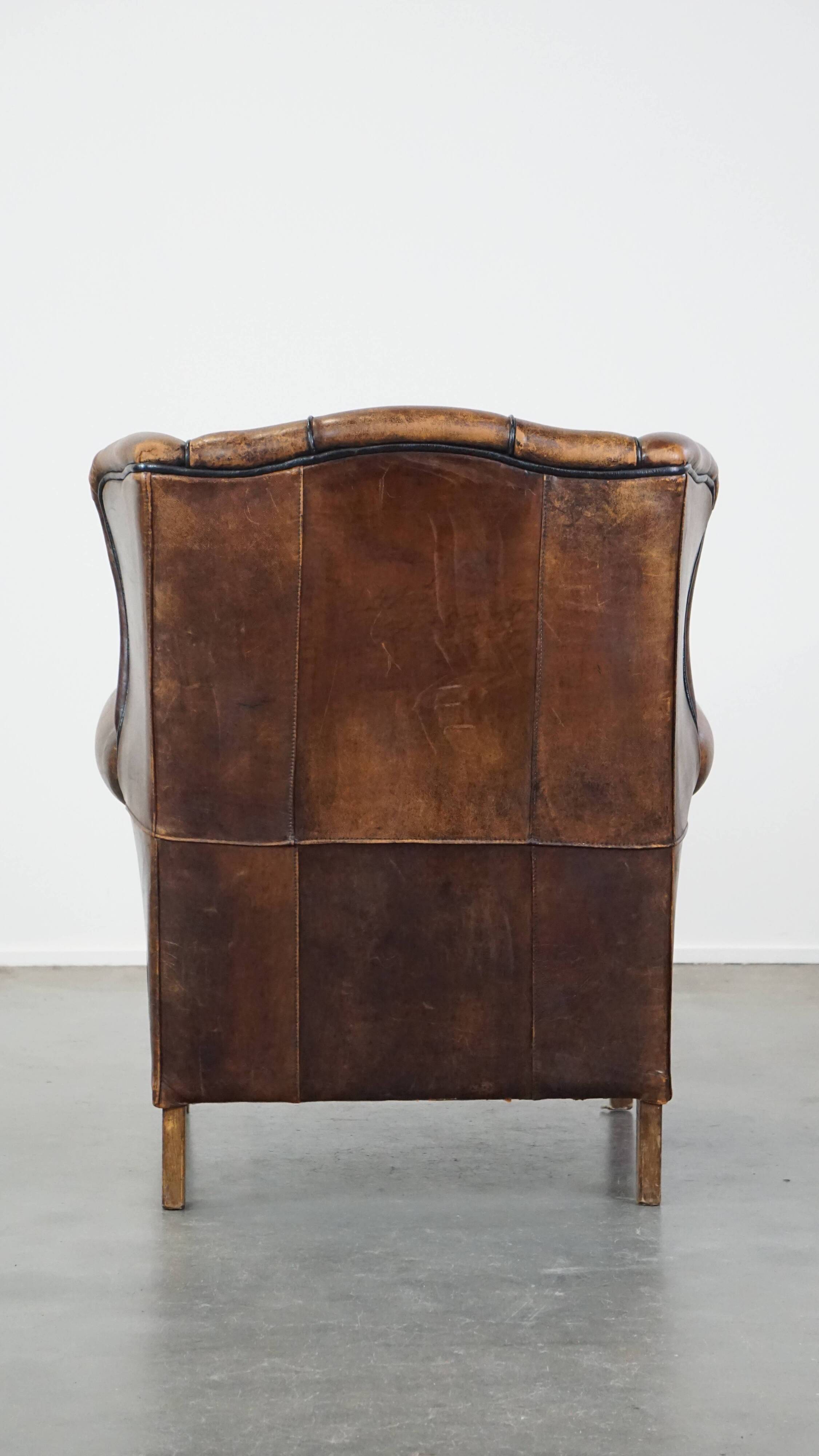 Sheep leather wing chair with patina