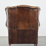Sheep leather wing chair with patina