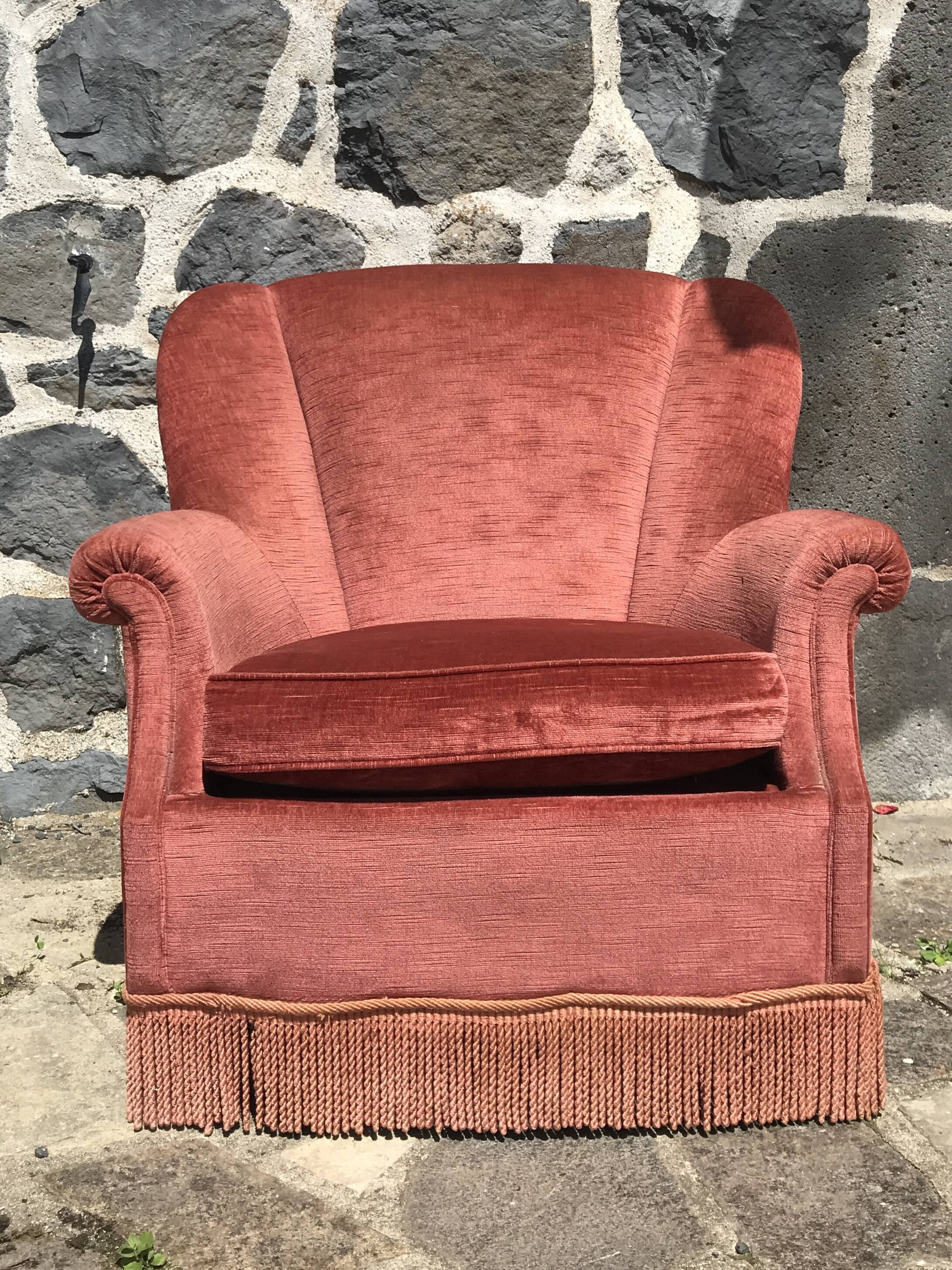 Vintage pink velvet armchair with fringes