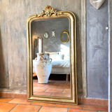 Antique gilded Louis-Philippe mirror, 19th century.