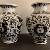Pair of black and white ceramic vases