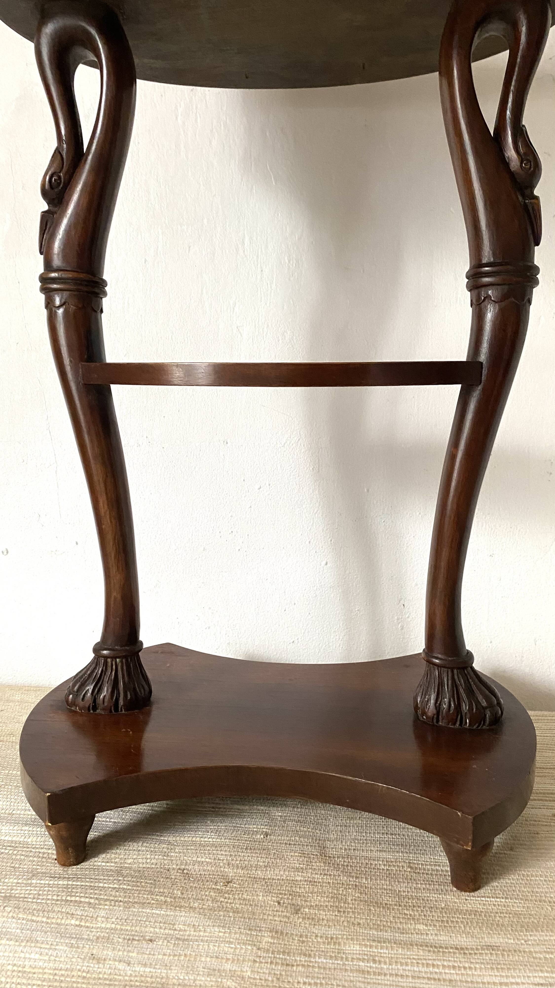 Empire style swan neck and lion paw pedestal table