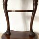 Empire style swan neck and lion paw pedestal table