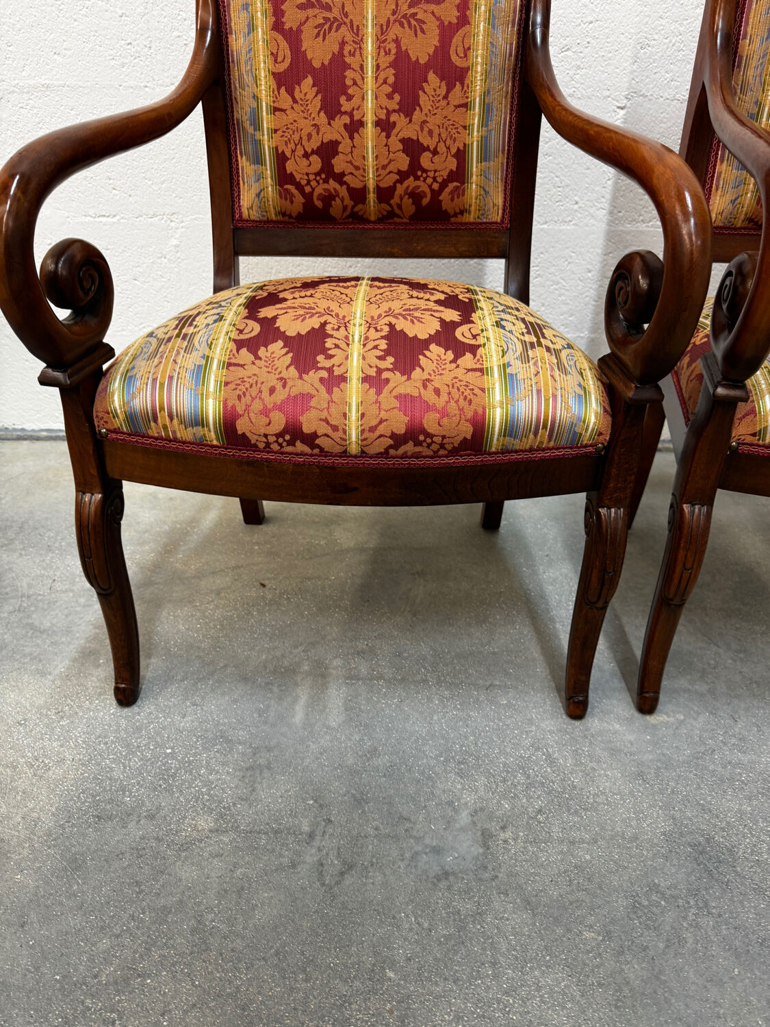 Pair of cross-back armchairs, Empire style, 19th century.