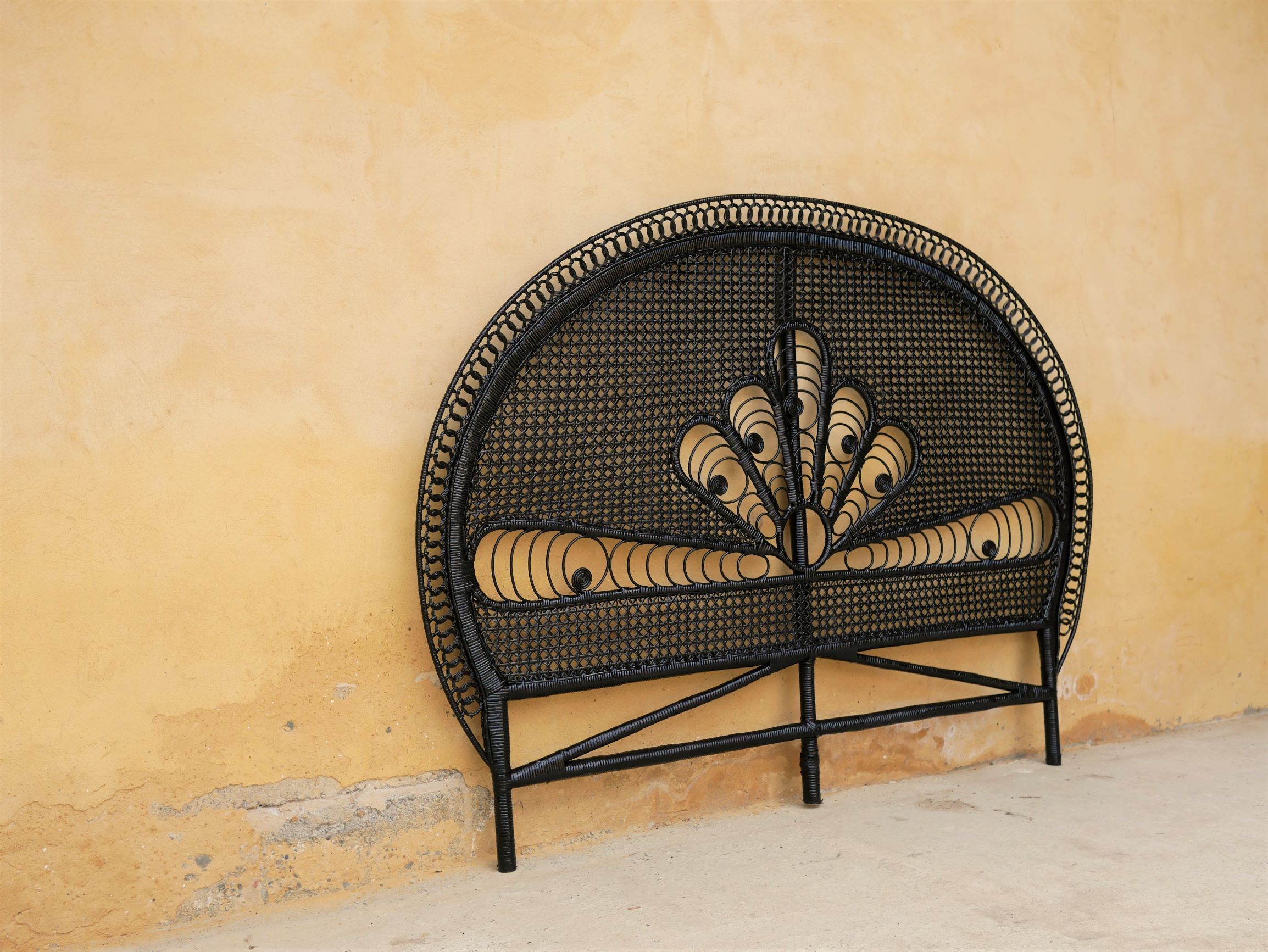 Vintage headboard in black rattan