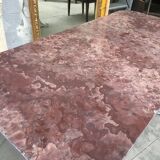 Large middle red speckled marble top table