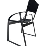 Vintage chair in saddle leather black steel 1970s