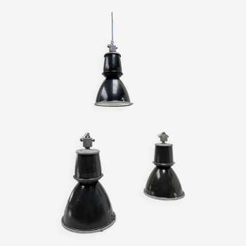 Suite of three industrial lamps.